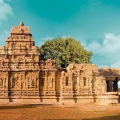 Pattadakal temple complex in Karnataka featuring UNESCO World Heritage Chalukyan architecture with intricately carved stone temples under a clear sky.
